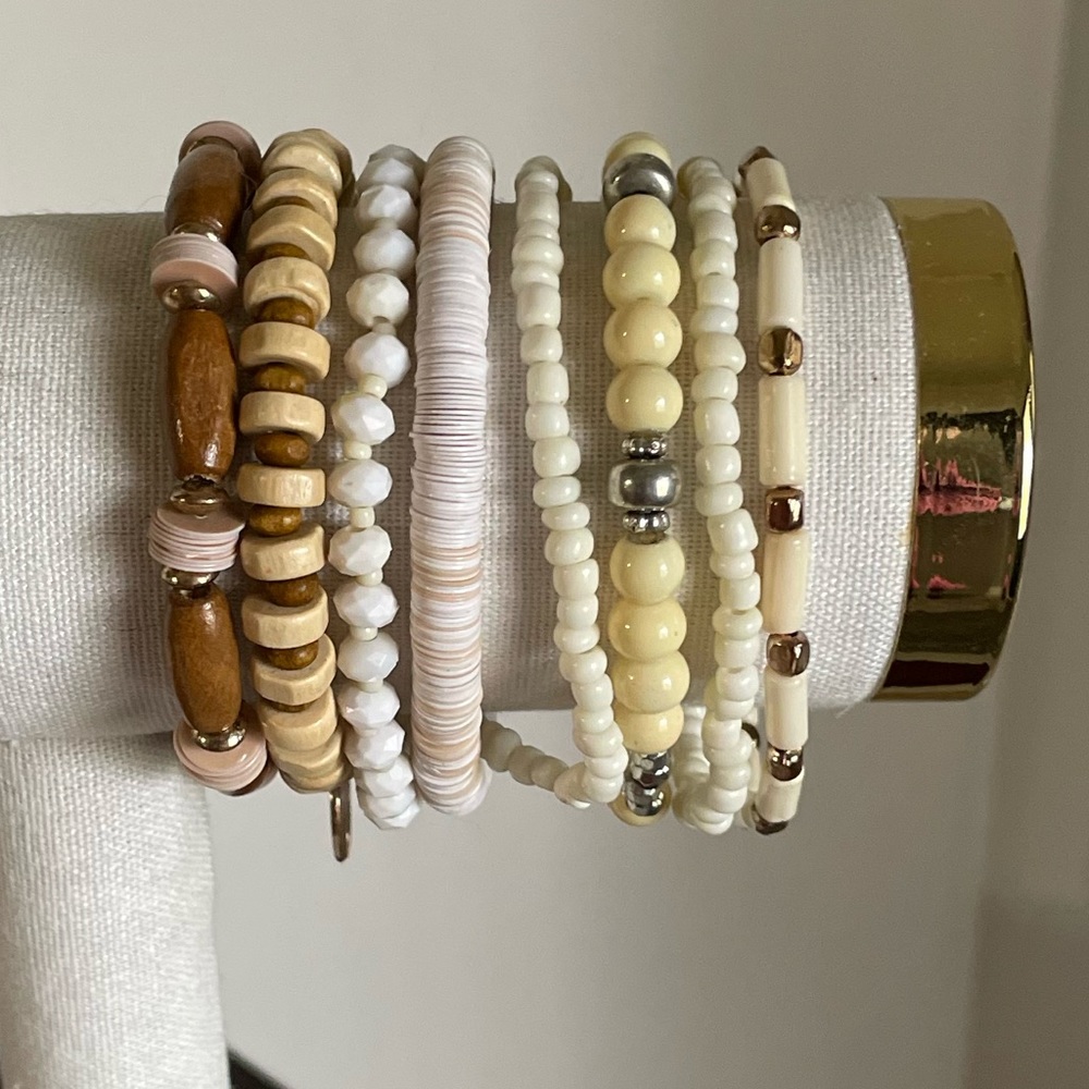 Set of eight elastic boho bracelets.